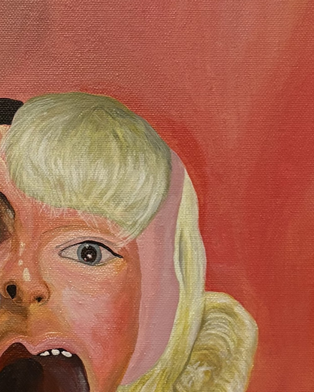 The Caregiver, detail of the blonde curls and blue eye